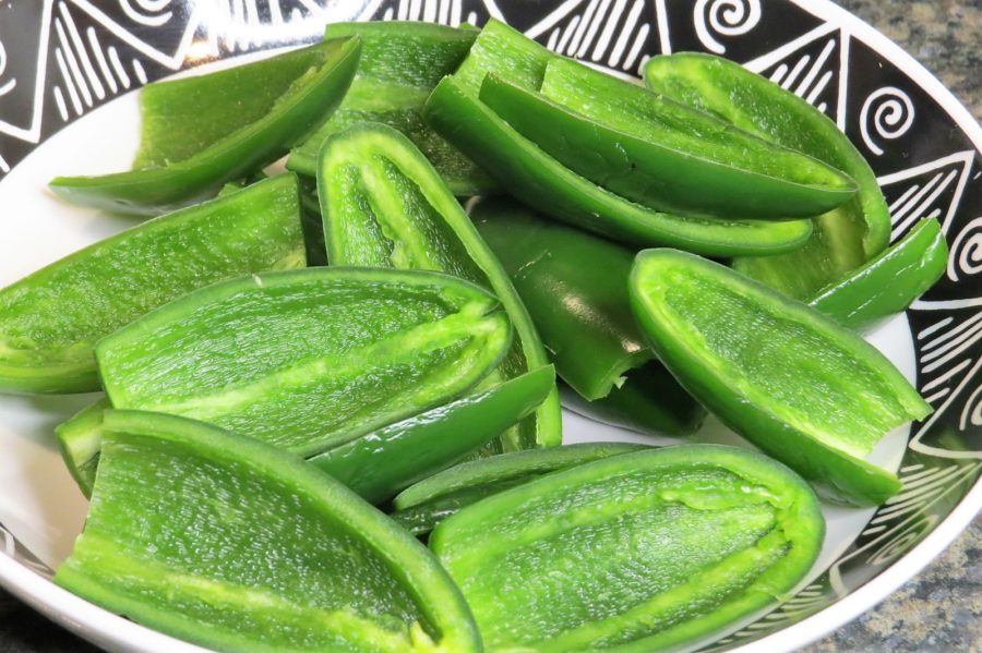 Halved jalapenos Sweet Pickled Peppers Halved jalapenos Sweet Pickled Peppers